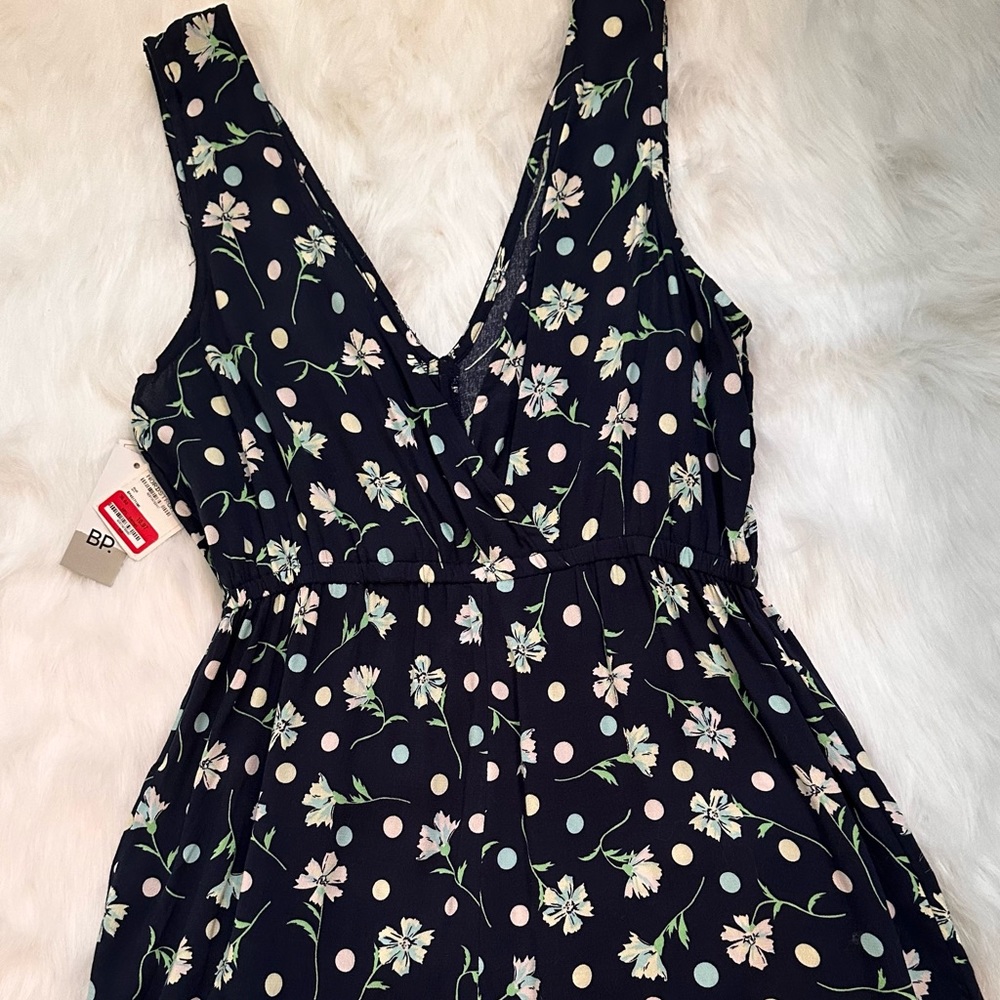 Navy floral romper NWT